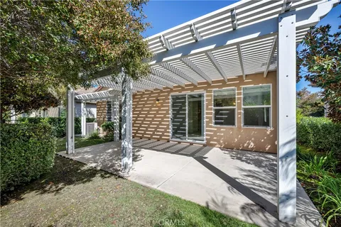 a view of balcony with two chairs and a table
