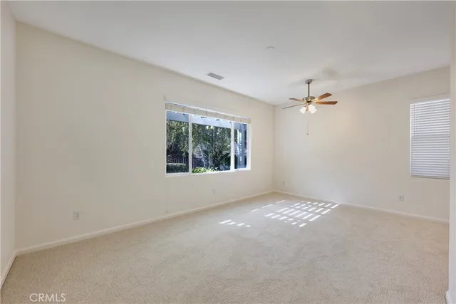 a view of a chairs and table in a patio