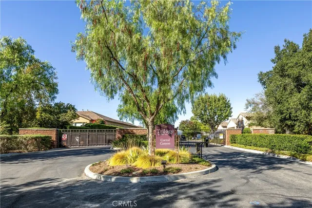 a view of a room with a livingroom and a bathroom