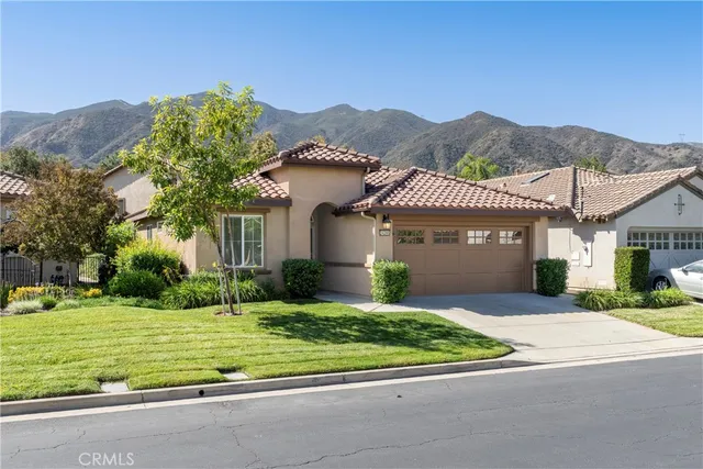 a bathroom with a double vanity sink and mirror