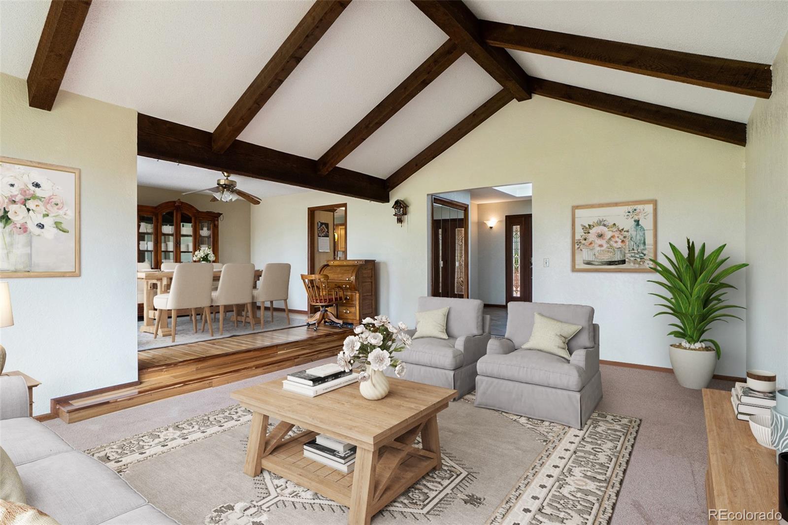 2701 Pheasant Run Berthoud, CO 80513 - Photo 12 of 40 a living room with furniture and wooden floor