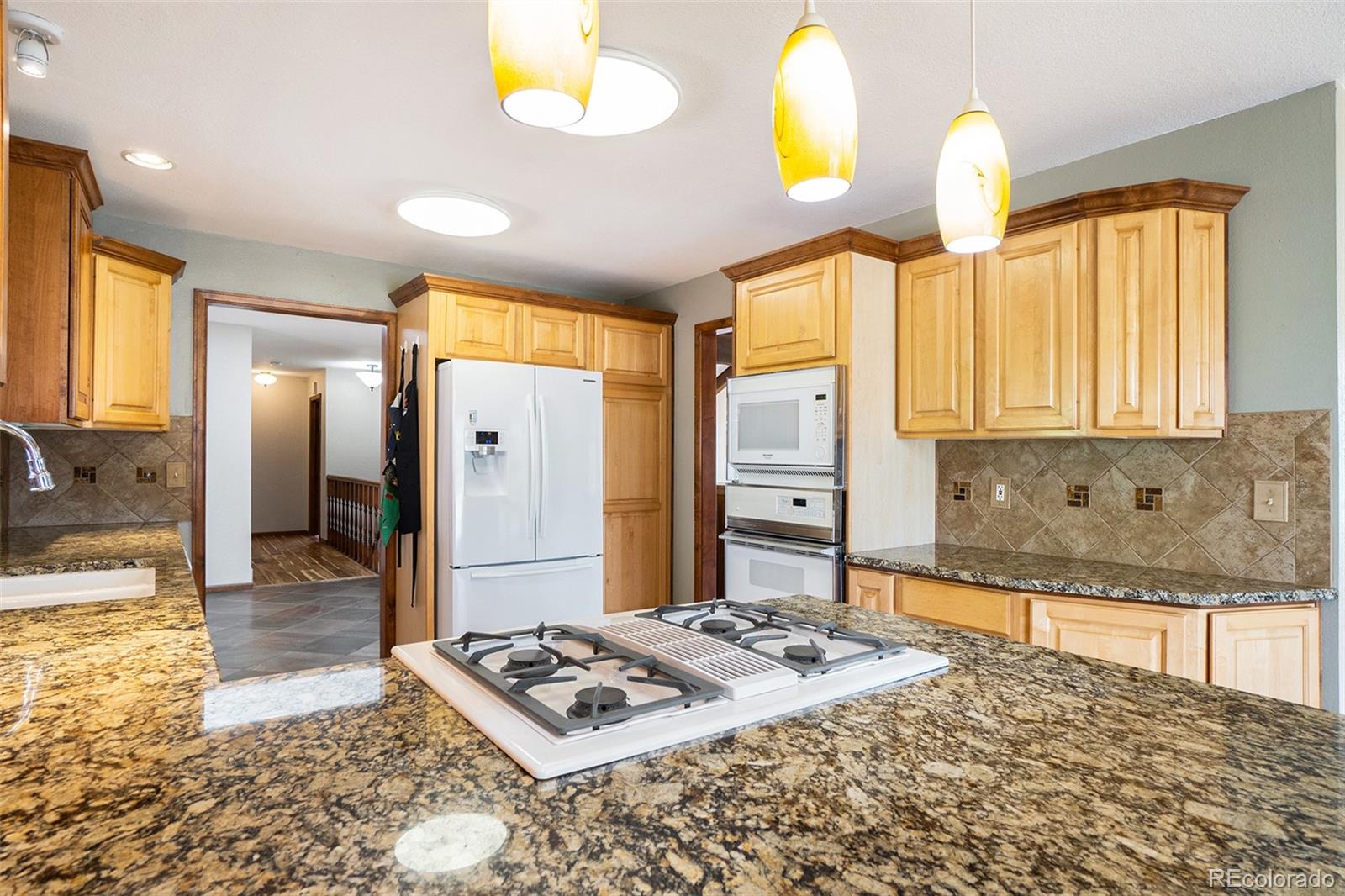 2701 Pheasant Run Berthoud, CO 80513 - Photo 15 of 40 a bedroom with a bed dresser and a large window