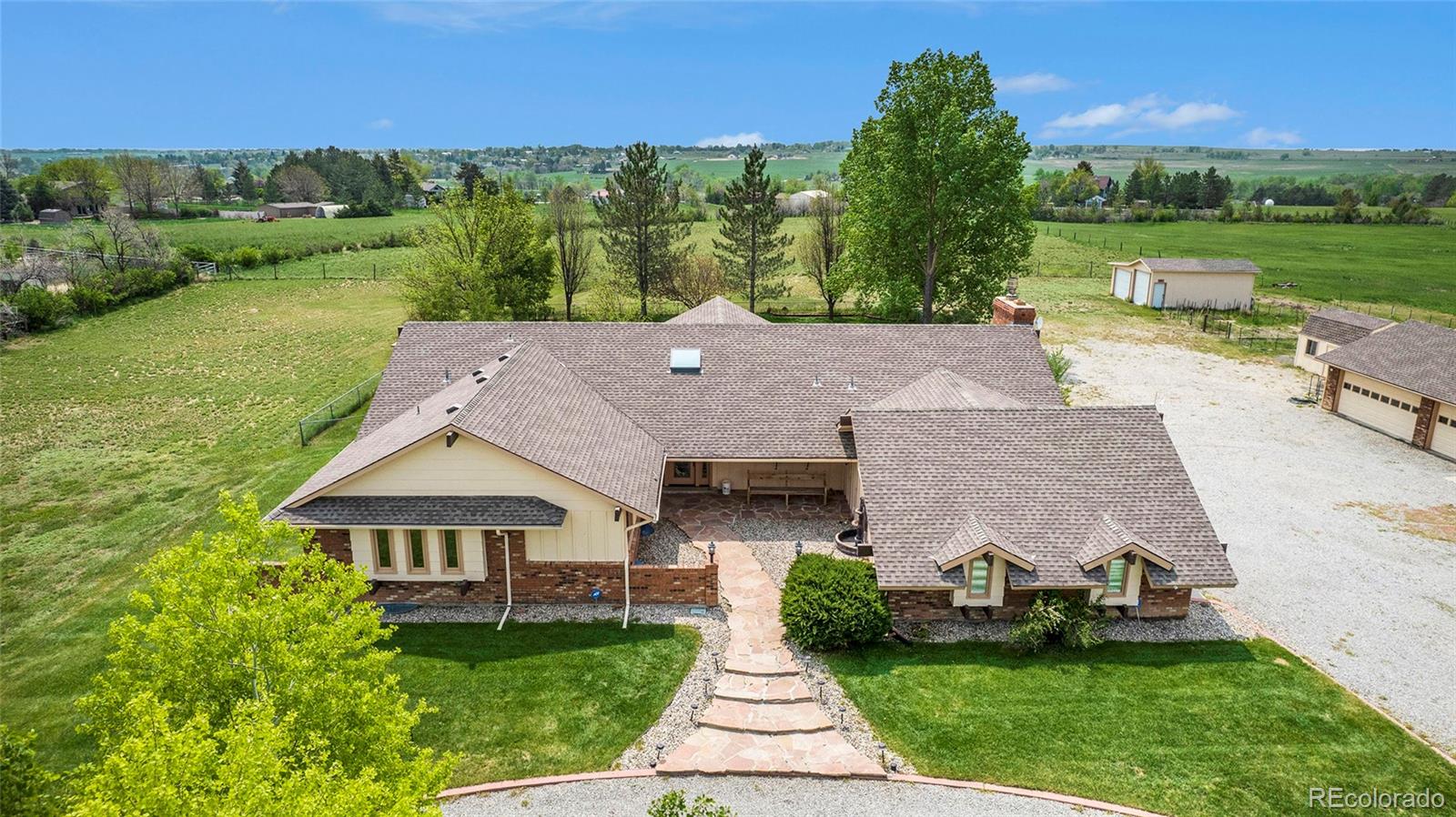 2701 Pheasant Run Berthoud, CO 80513 - Photo 2 of 40 an aerial view of a house with garden