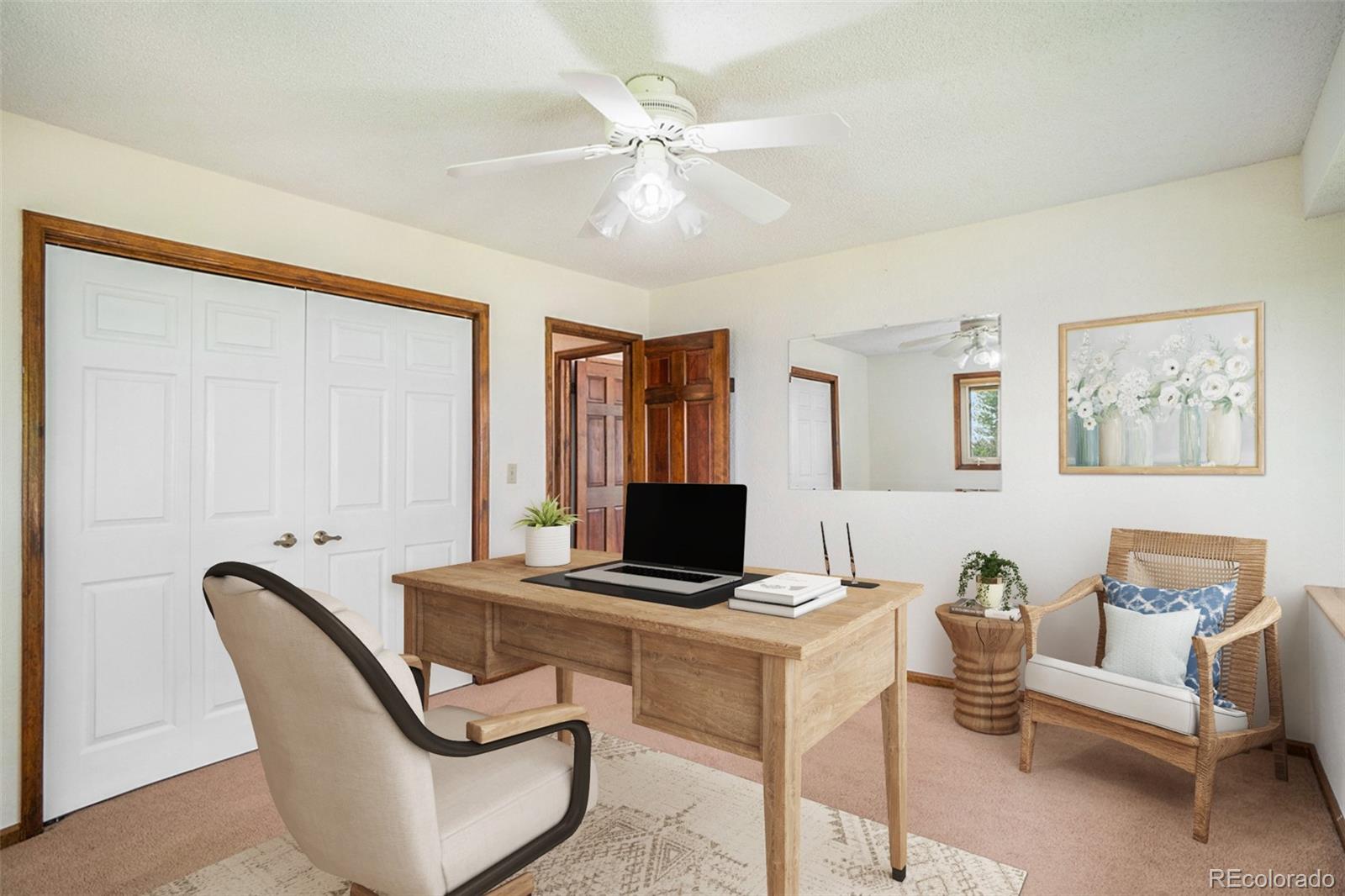 2701 Pheasant Run Berthoud, CO 80513 - Photo 26 of 40 a workspace with furniture and couch