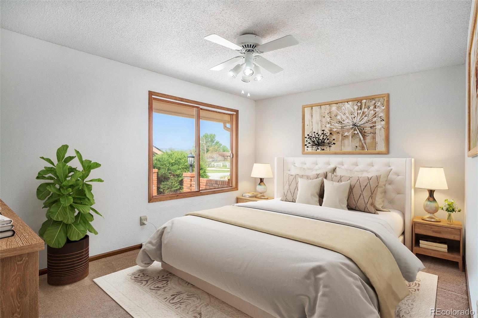 2701 Pheasant Run Berthoud, CO 80513 - Photo 29 of 40 a bedroom with a bed and a window
