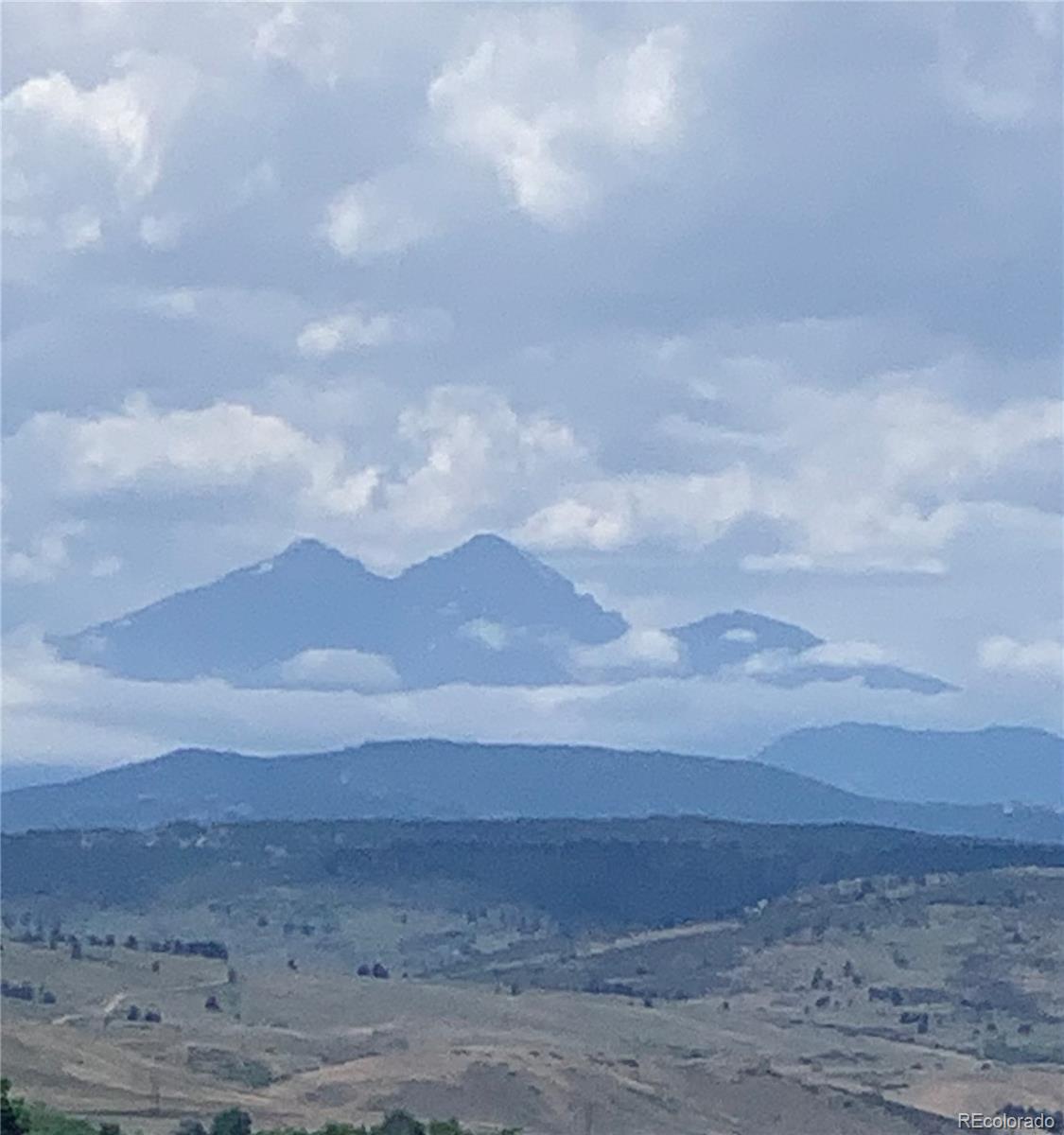 2701 Pheasant Run Berthoud, CO 80513 - Photo 8 of 40 a view of an ocean beach and mountain