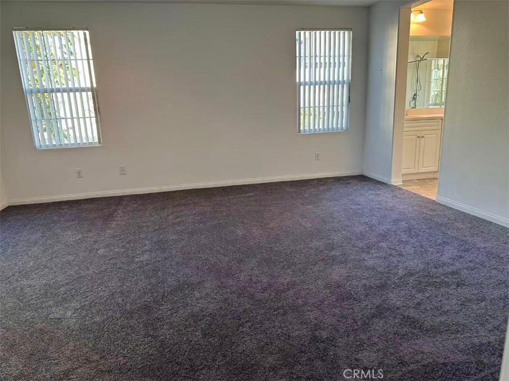 650 Huron Place Claremont, CA 91711 - Photo 12 of 28 an empty room with windows