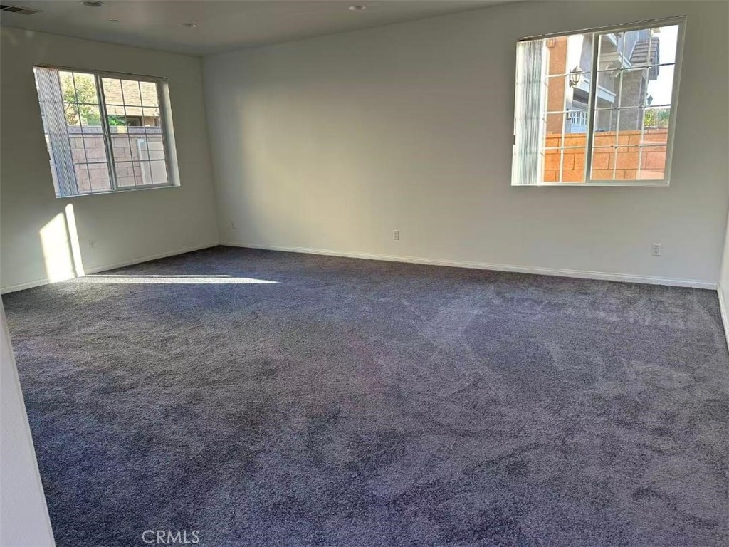650 Huron Place Claremont, CA 91711 - Photo 16 of 28 an empty room with windows