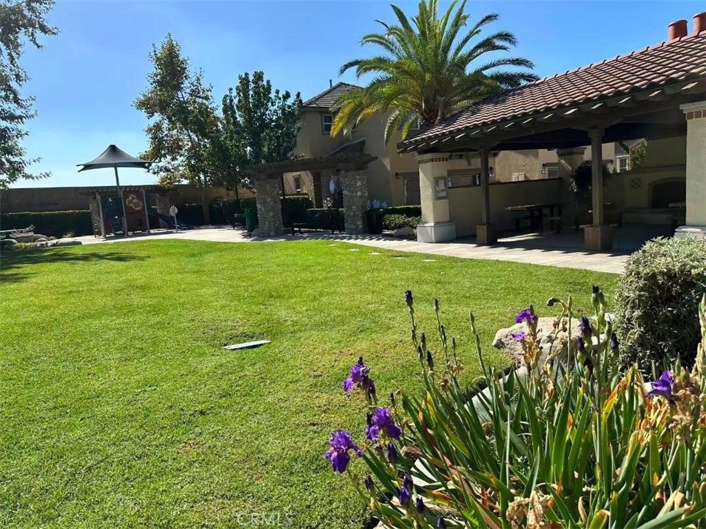 650 Huron Place Claremont, CA 91711 - Photo 25 of 28 a view of a house with a garden