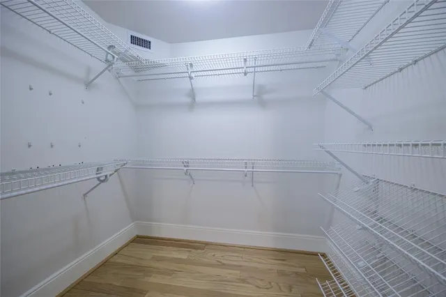 a view of a room with racks on the wall
