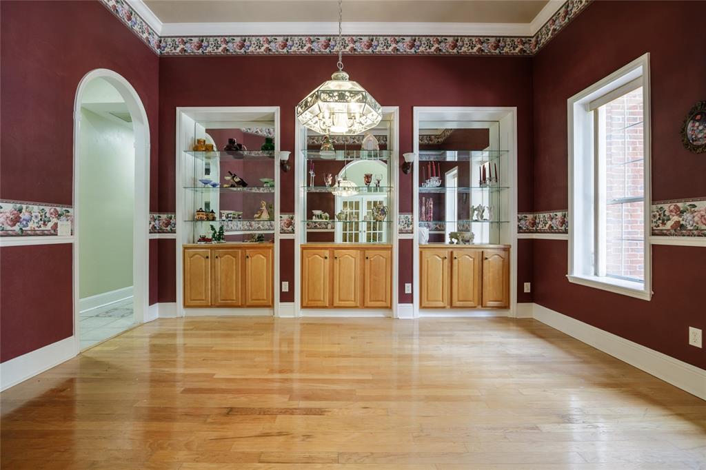 7513 Southwest 35th Way Gainesville, FL 32608 - Photo 7 of 38 a view of a kitchen with an entryway and chandelier