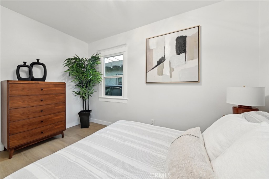 1328 Dawson Avenue Long Beach, CA 90804 - Photo 13 of 22 a bedroom with a bed and a window