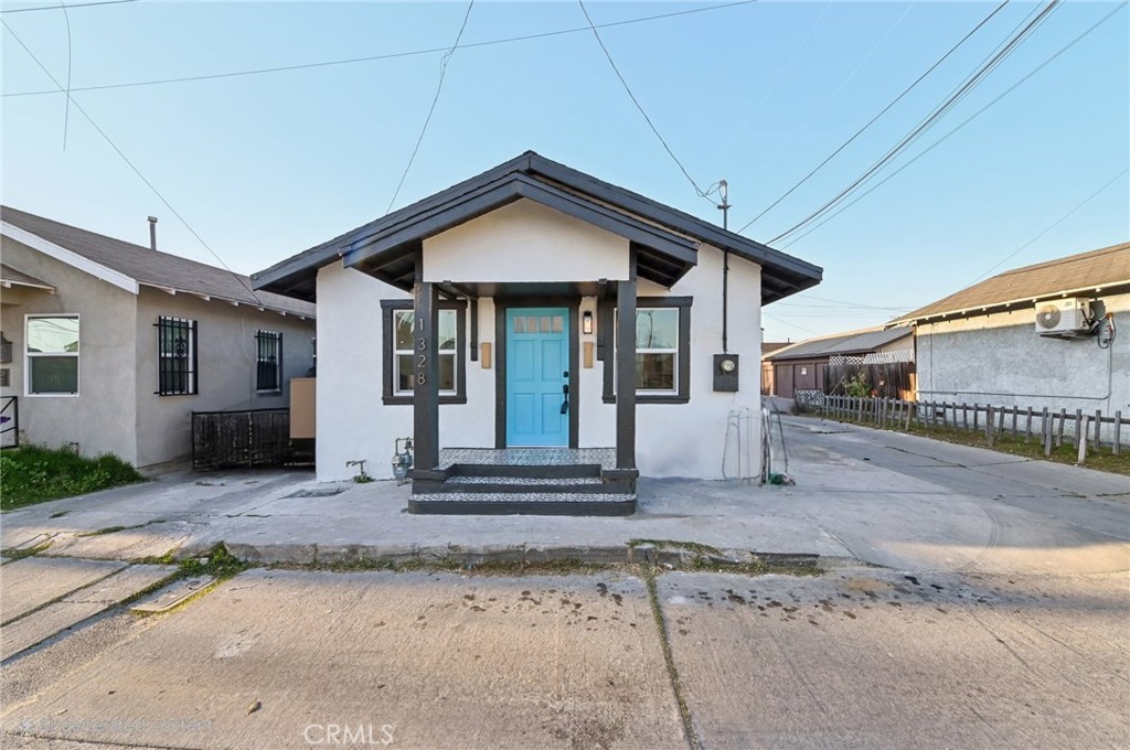 1328 Dawson Avenue Long Beach, CA 90804 - Photo 18 of 22 a front view of a house with a yard