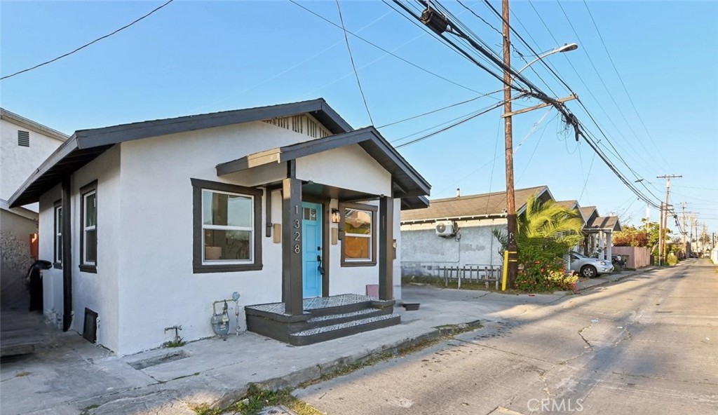 1328 Dawson Avenue Long Beach, CA 90804 - Photo 20 of 22 a front view of a house with garden