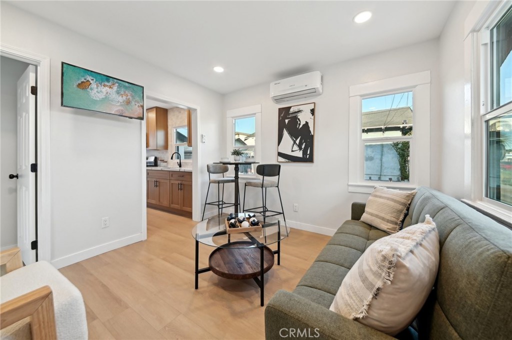 1328 Dawson Avenue Long Beach, CA 90804 - Photo 3 of 22 a living room with furniture and wooden floor