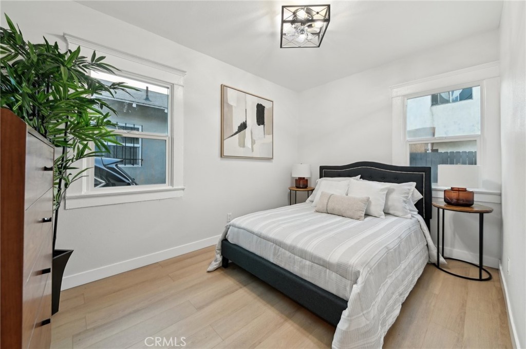 1328 Dawson Avenue Long Beach, CA 90804 - Photo 10 of 22 a bedroom with bed and a window