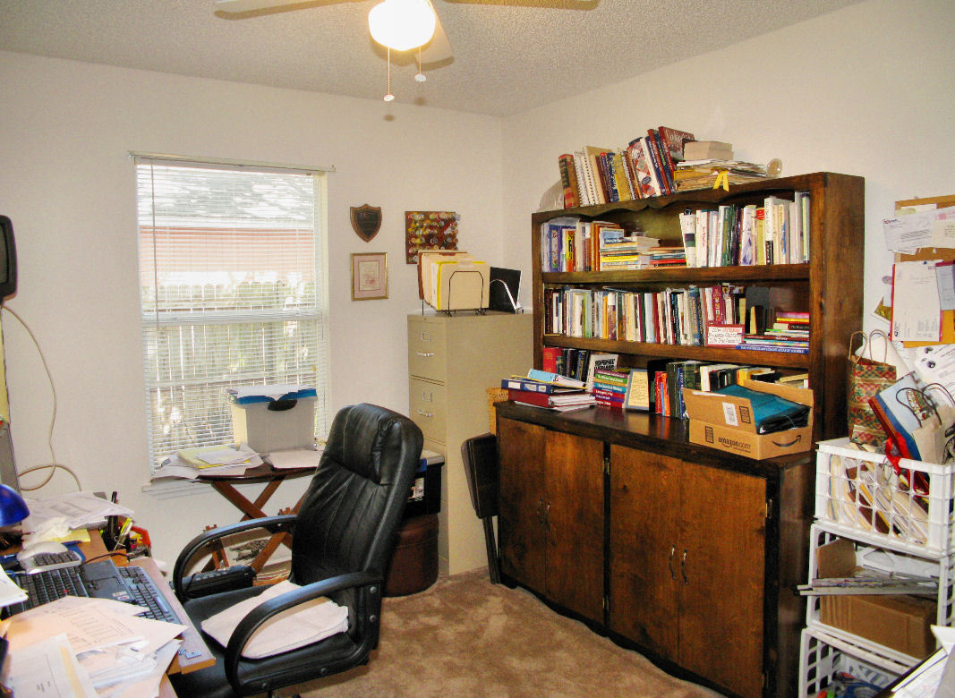 954 Stocks Street Atlantic Beach, FL 32233 - Photo 14 of 21 a view of a workspace with furniture and a window