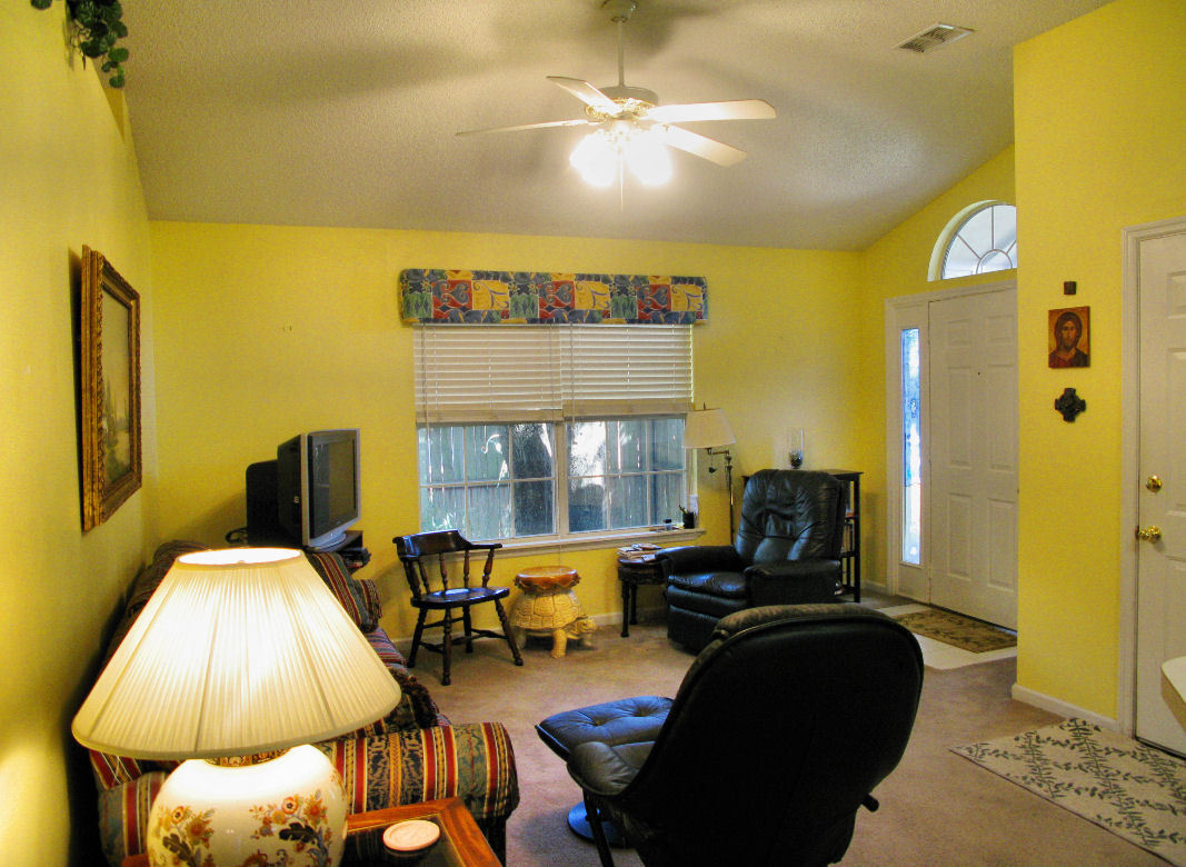 954 Stocks Street Atlantic Beach, FL 32233 - Photo 5 of 21 a living room with furniture and a flat screen tv