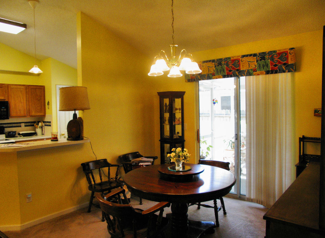 954 Stocks Street Atlantic Beach, FL 32233 - Photo 6 of 21 a view of a dining room with furniture and wooden floor