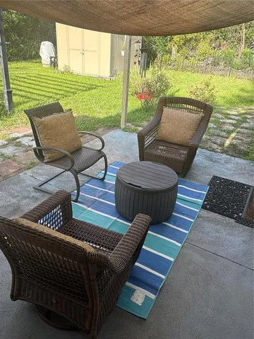 a view of a two chairs in the roof deck