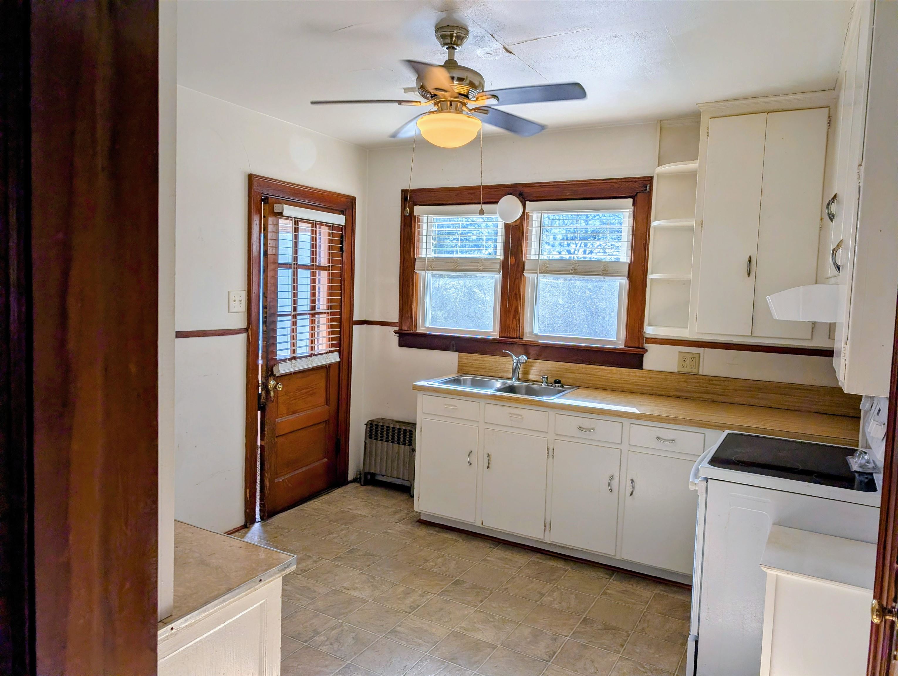 45 Methodist Lane Hot Springs, VA 24445 - Photo 14 of 17 a kitchen with stainless steel appliances granite countertop a stove a sink and a refrigerator