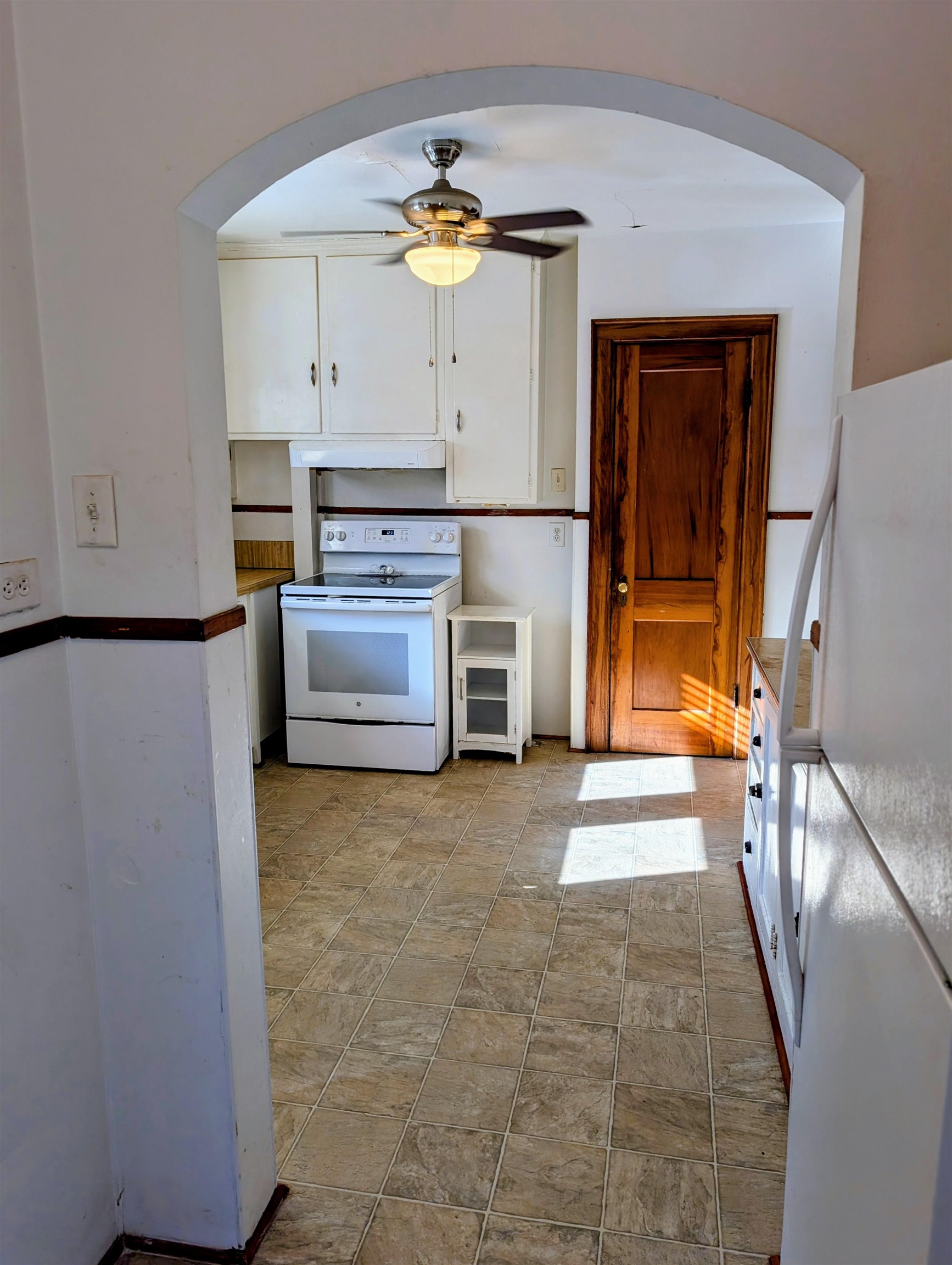 45 Methodist Lane Hot Springs, VA 24445 - Photo 16 of 17 a view of a kitchen with furniture and a fireplace