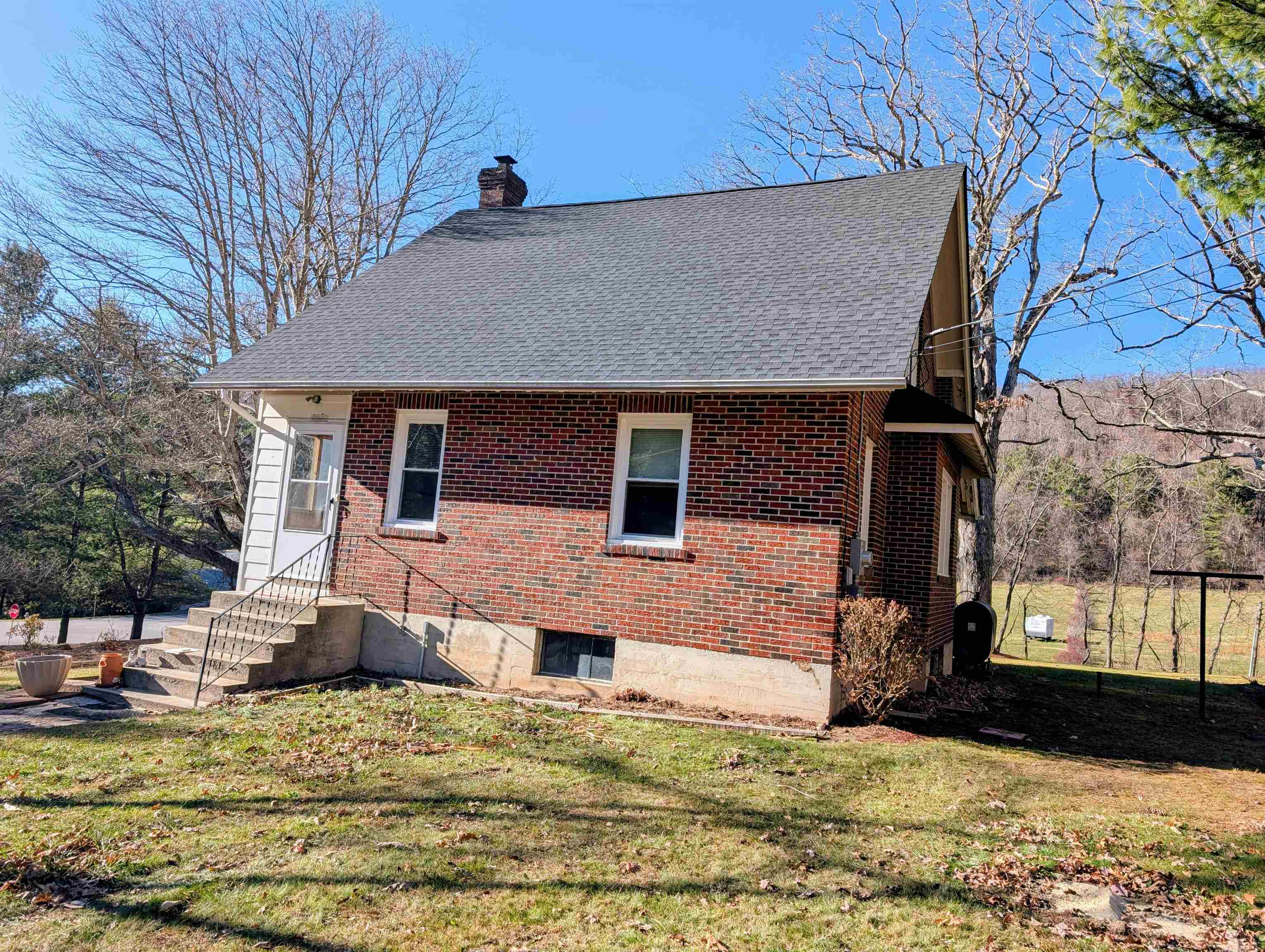 45 Methodist Lane Hot Springs, VA 24445 - Photo 4 of 17 a house that has a tree in front of it