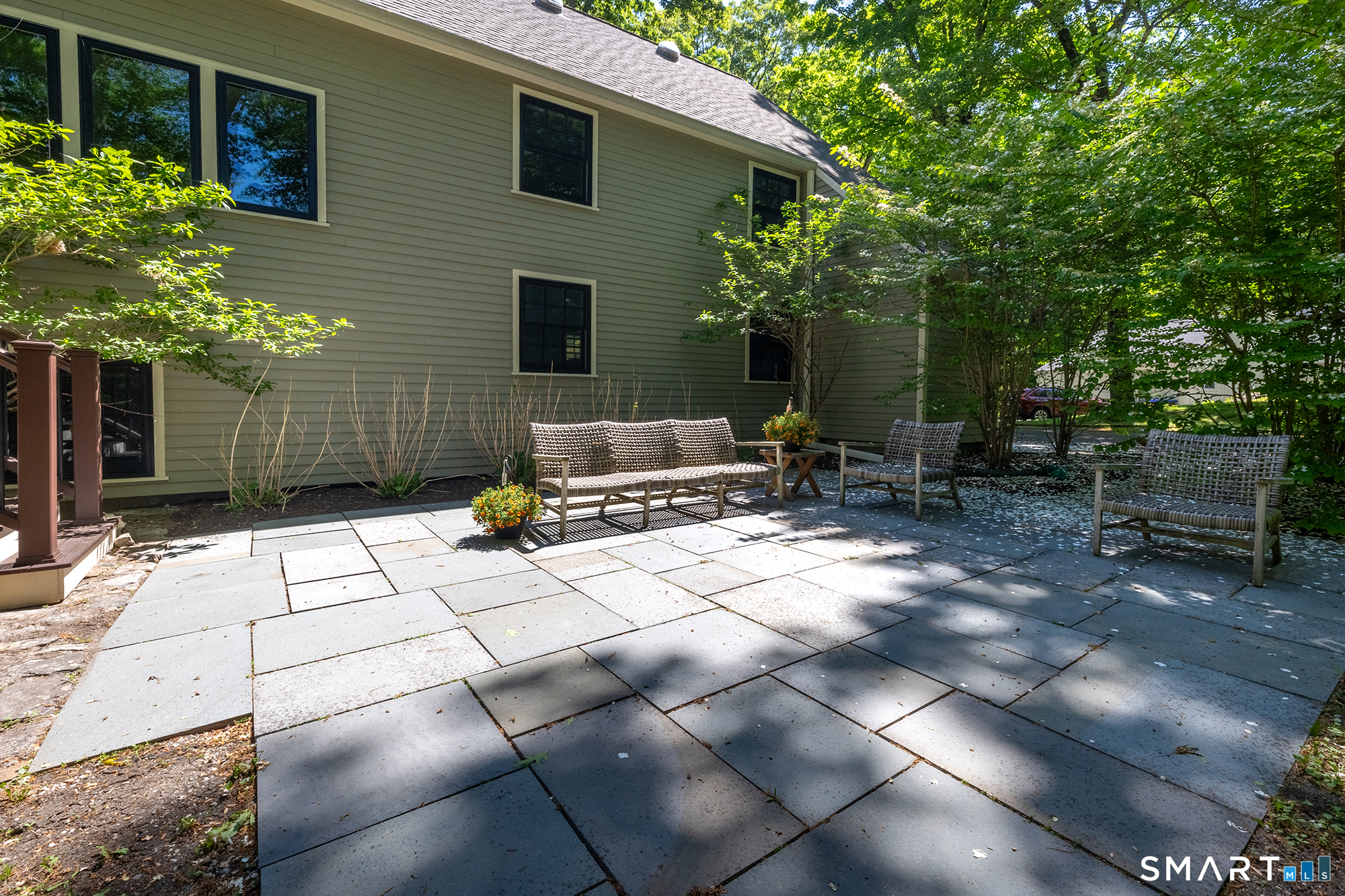 33 Hunter Lane Ridgefield, CT 06877 - Photo 35 of 39 a view of backyard with outdoor seating and plants