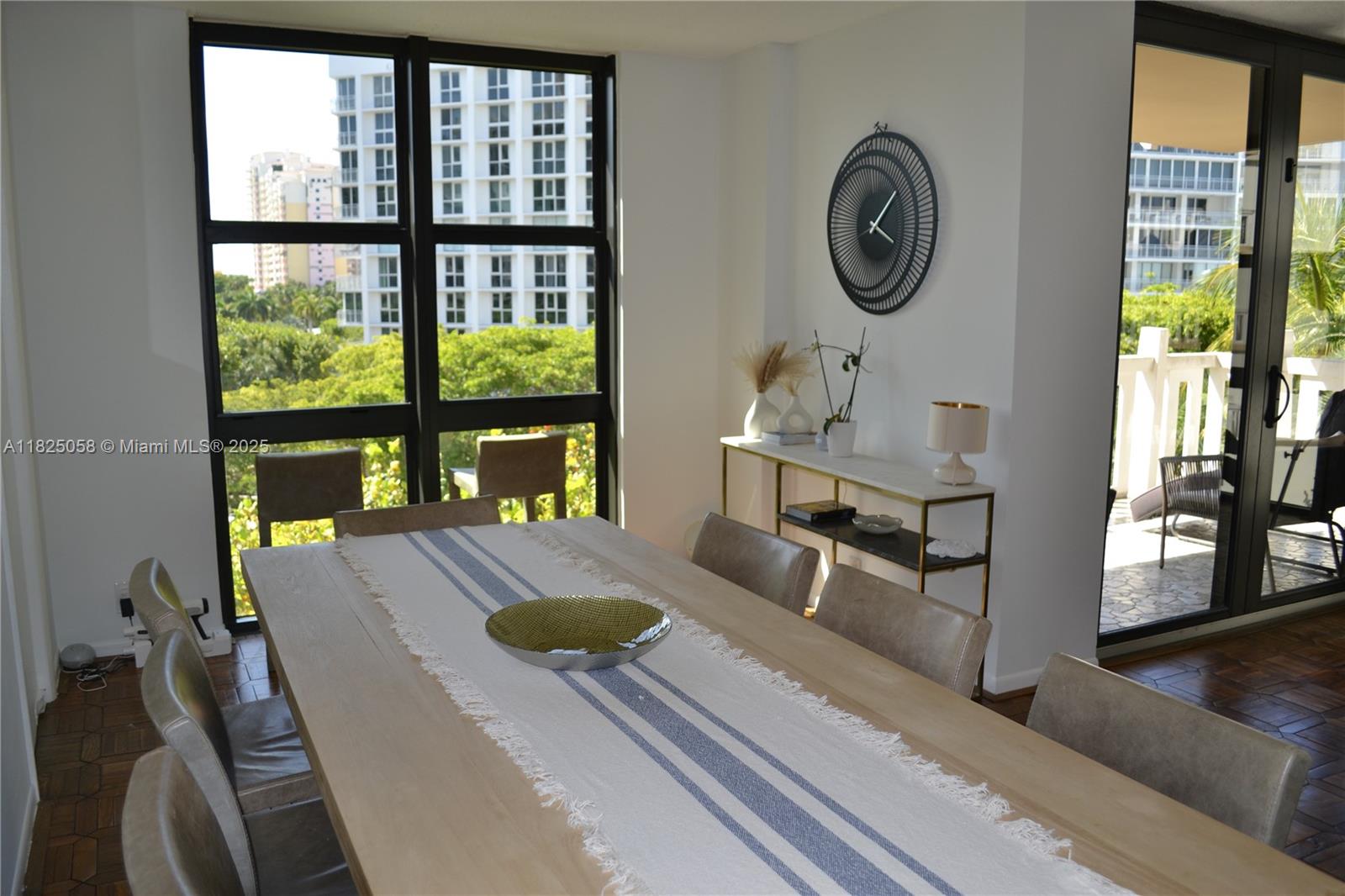 1111 Crandon Boulevard, Unit C402 Key Biscayne, FL 33149 - Photo 3 of 32 a living room with furniture and a window