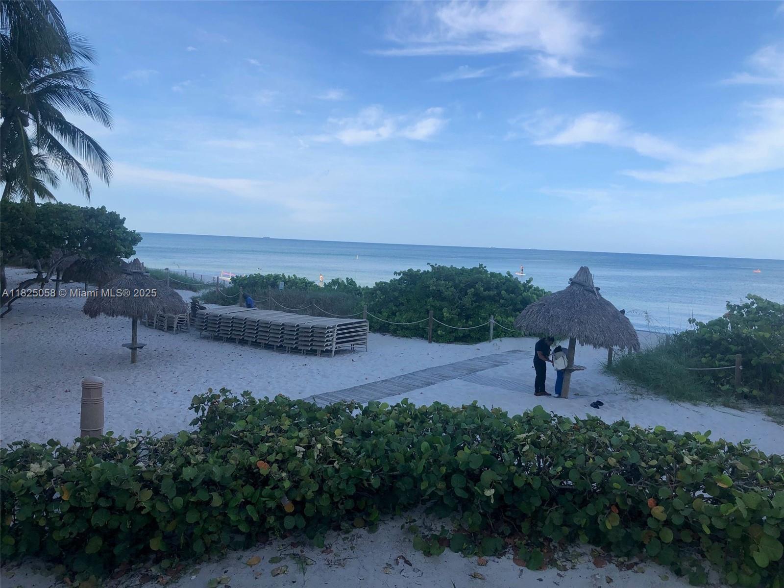 1111 Crandon Boulevard, Unit C402 Key Biscayne, FL 33149 - Photo 31 of 32 a view of a lake with outdoor space