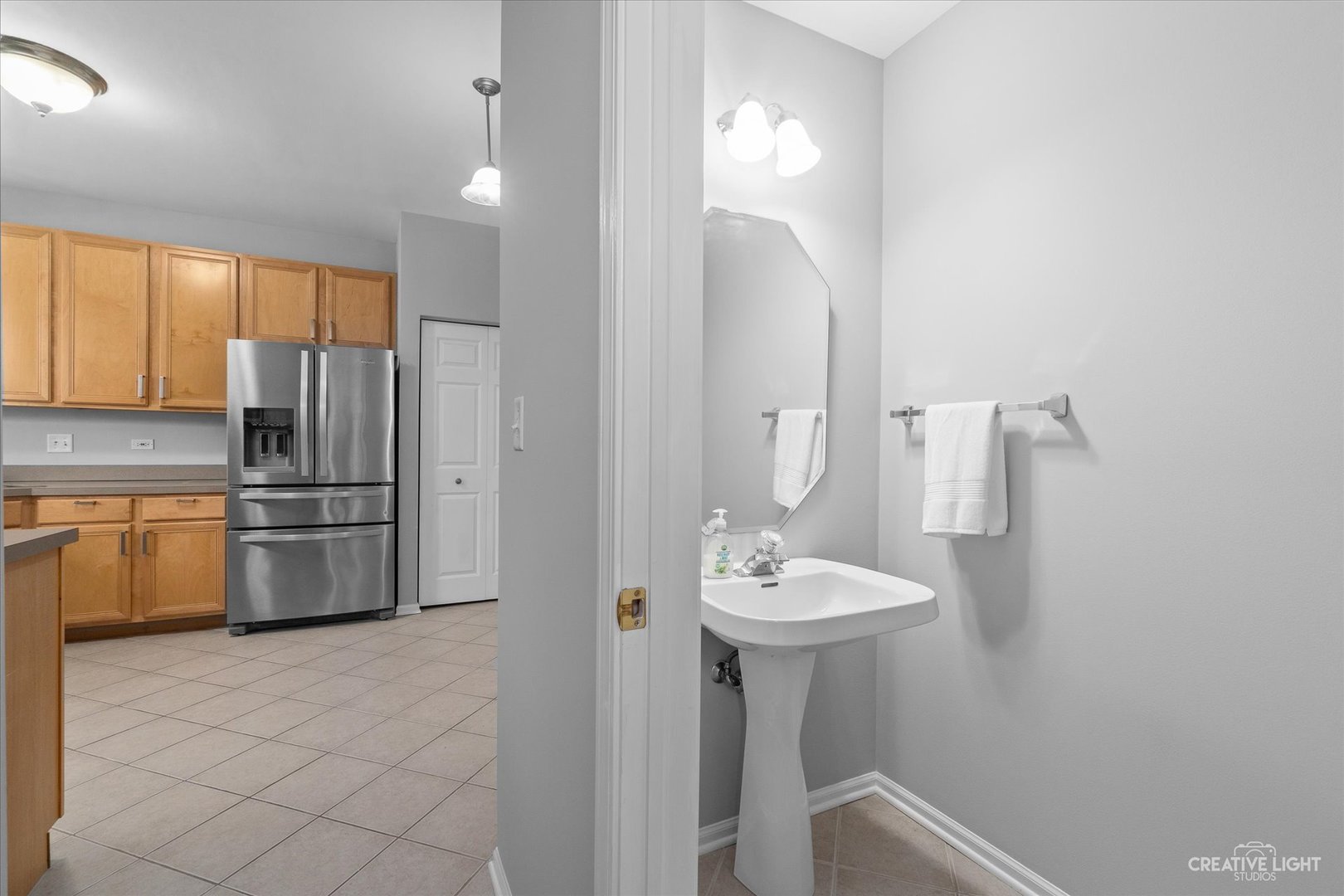19 Lily Court Bolingbrook, IL 60440 - Photo 12 of 31 a bathroom with a sink toilet and a mirror