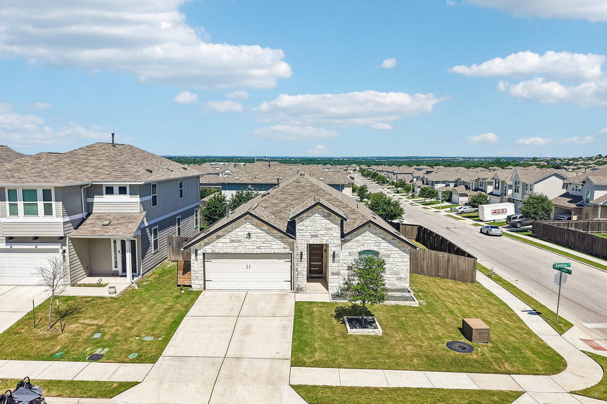 10700 Sentinel Drive Austin, TX 78747 - Photo 24 of 27 Corner-lot living with extra breathing room and a little more elbow space.