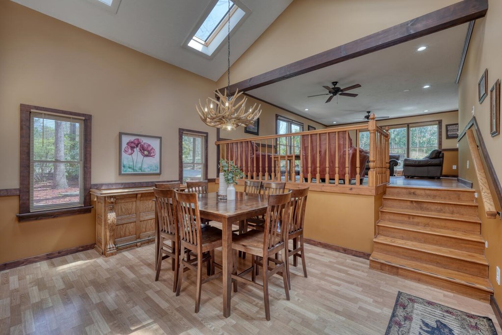 264 Tanglewood Drive Blue Ridge, GA 30513 - Photo 24 of 47 a view of a dining room with furniture and wooden floor