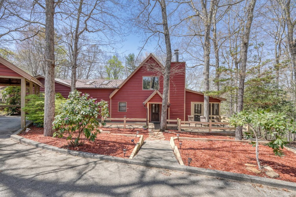 264 Tanglewood Drive Blue Ridge, GA 30513 - Photo 3 of 47 a front view of a house with a yard