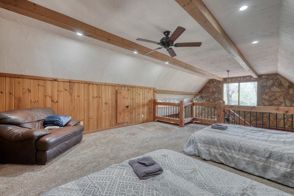 264 Tanglewood Drive Blue Ridge, GA 30513 - Photo 42 of 47 a bedroom with furniture and a ceiling fan
