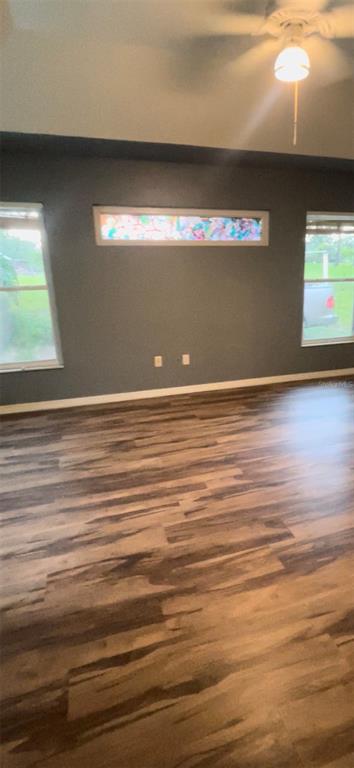 22631 Robbins Road Astatula, FL 34705 - Photo 16 of 35 a view of an empty room with a window