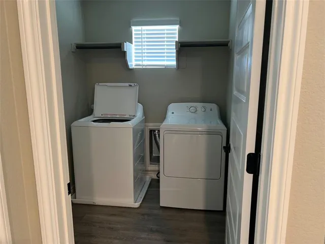 a utility room with dryer and washer