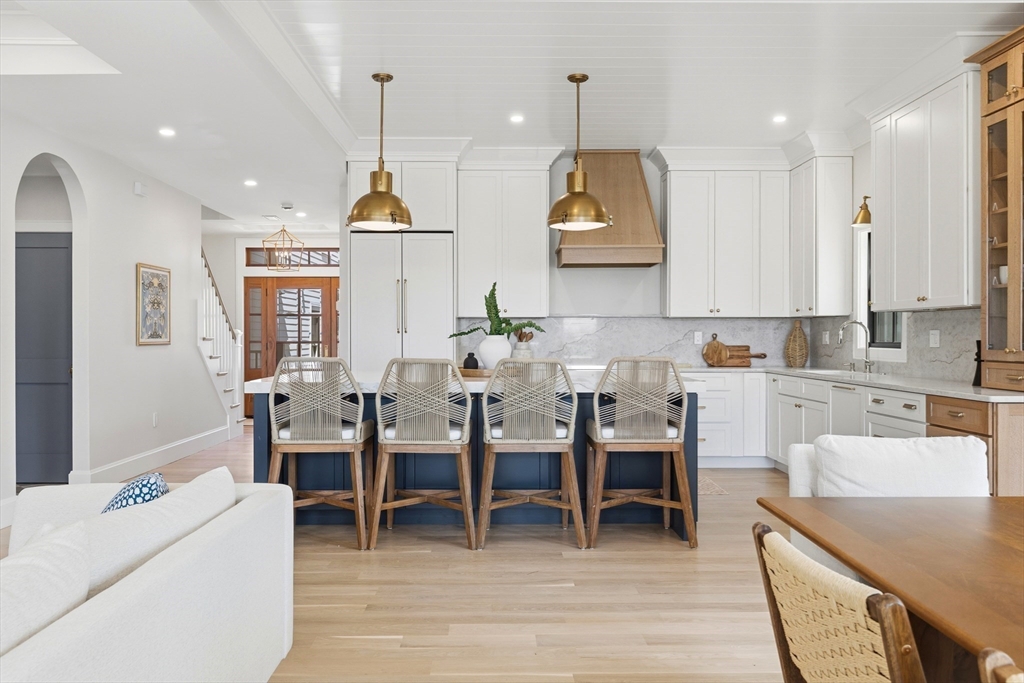 847 East 5th Street, Unit 2 Boston, MA 02127 - Photo 2 of 24 a kitchen with lots of counter top space and dining table