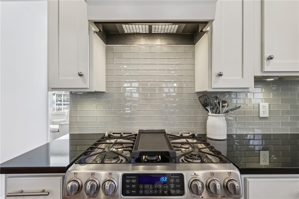 101 Dartmouth Avenue Avondale Estates, GA 30002 - Photo 16 of 53 a kitchen with stove and cabinets