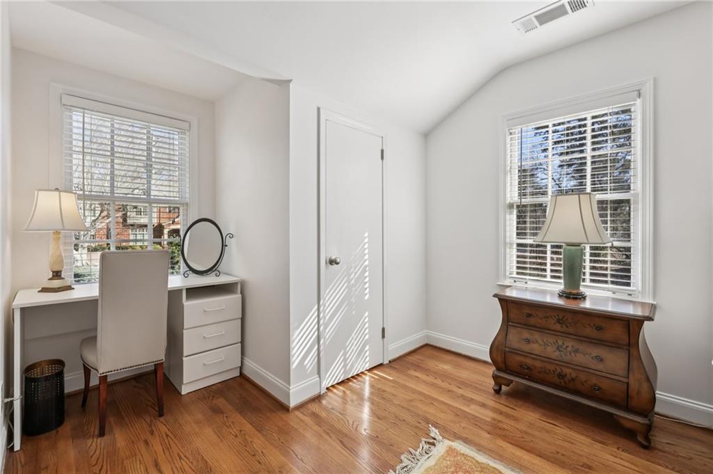 101 Dartmouth Avenue Avondale Estates, GA 30002 - Photo 26 of 53 a room with wooden floor and windows
