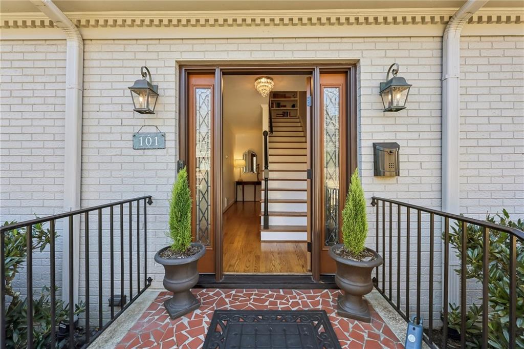 101 Dartmouth Avenue Avondale Estates, GA 30002 - Photo 3 of 53 a view of a porch with a door and a chair