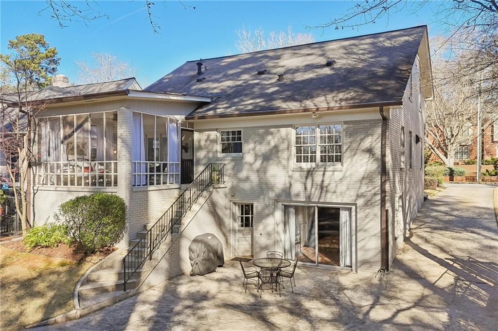101 Dartmouth Avenue Avondale Estates, GA 30002 - Photo 42 of 53 a view of a patio with table and chairs and potted plants