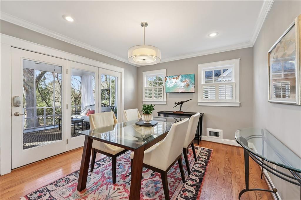 101 Dartmouth Avenue Avondale Estates, GA 30002 - Photo 9 of 53 a view of a dining room with furniture wooden floor and a chandelier