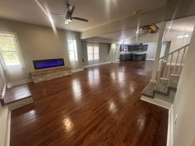 a view of a room with window and cabinet