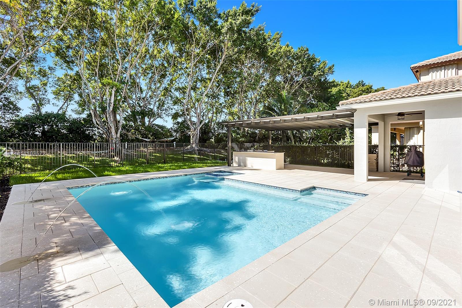 19124 Seneca Avenue Weston, FL 33332 - Photo 17 of 38 a view of a house with backyard and sitting area