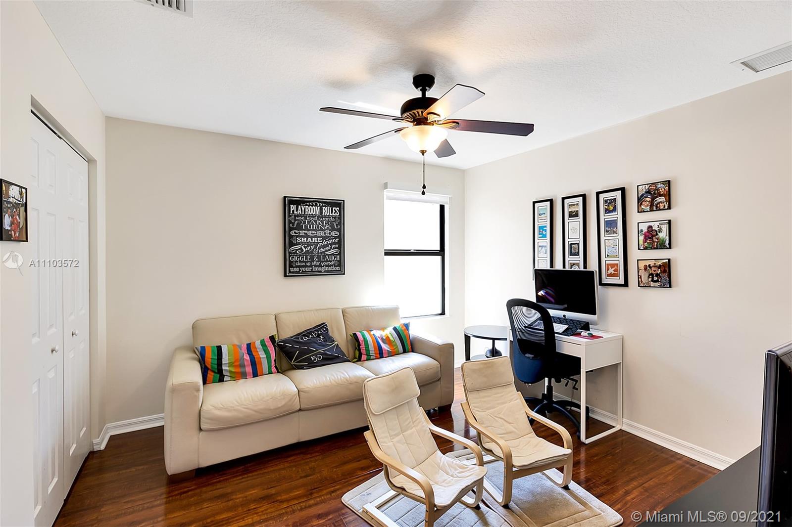 19124 Seneca Avenue Weston, FL 33332 - Photo 25 of 38 a living room with furniture