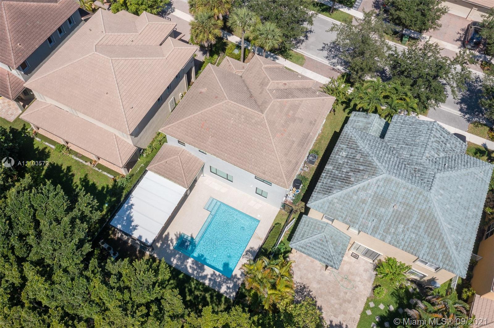 19124 Seneca Avenue Weston, FL 33332 - Photo 34 of 38 an aerial view of a house