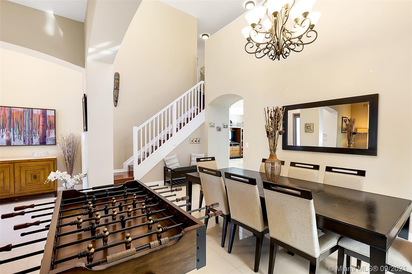 19124 Seneca Avenue Weston, FL 33332 - Photo 5 of 38 a view of a workspace with furniture