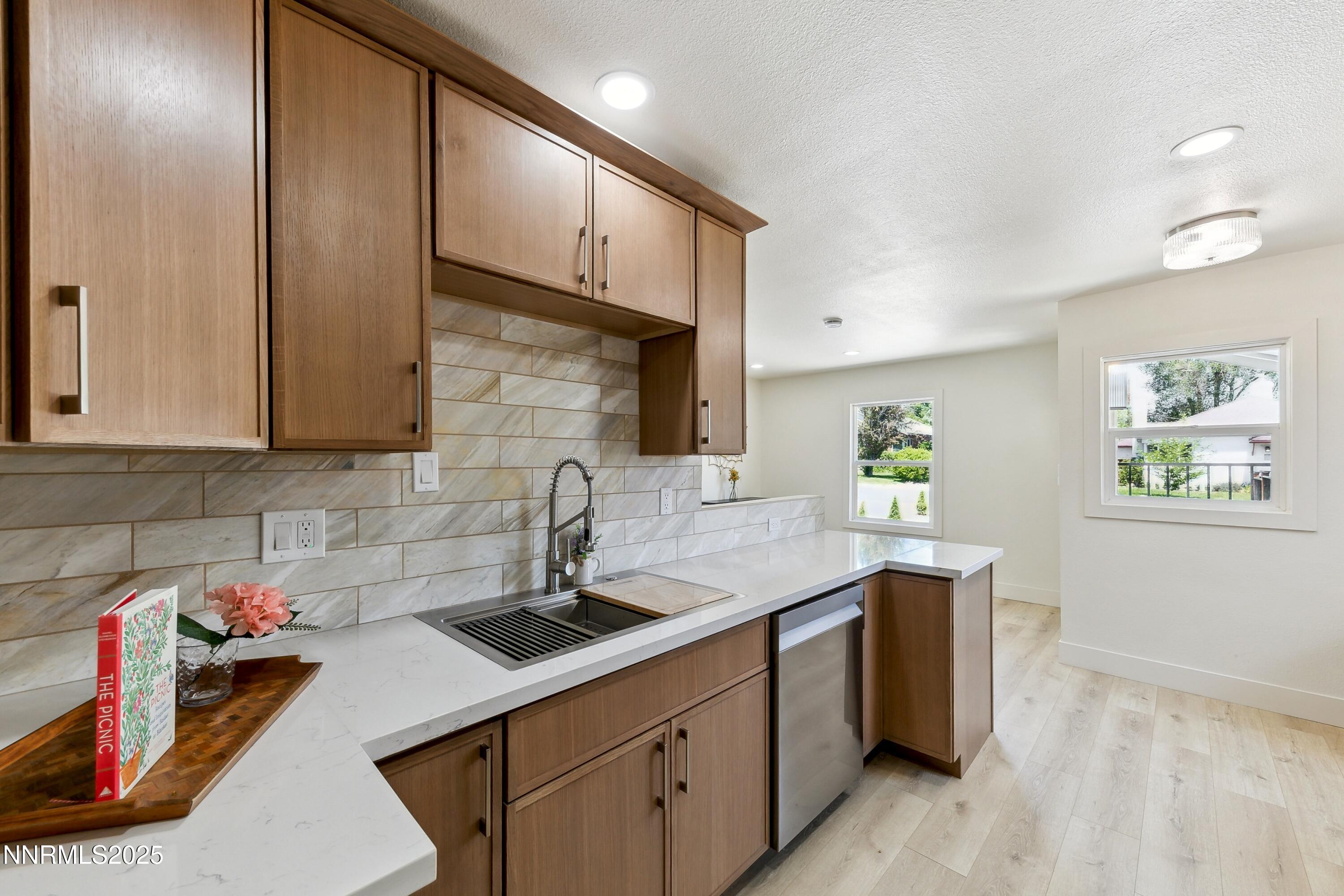 728 West Pueblo Street Reno, NV 89509 - Photo 14 of 33 a kitchen with a sink cabinets and appliances