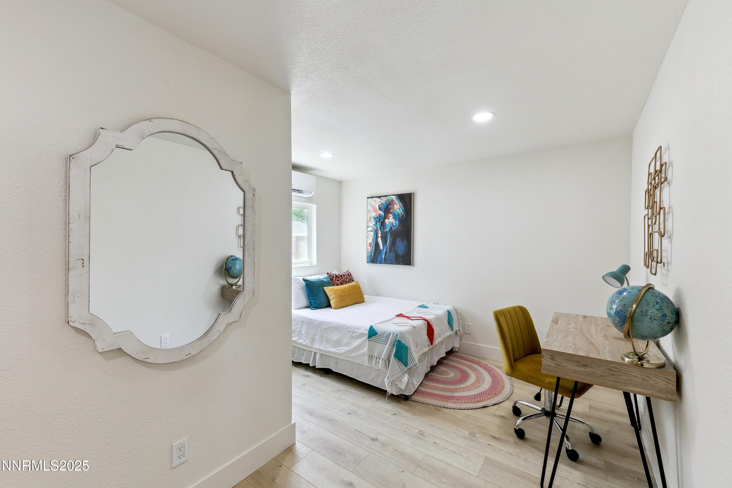 728 West Pueblo Street Reno, NV 89509 - Photo 19 of 33 a bed room with a bed and a chair